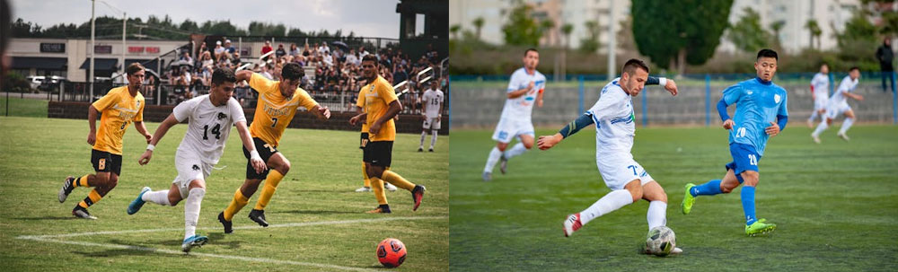 People playing football in football kits. Some in yellow and black kit, some in white kit, some in white and blue, and some in blue kit.