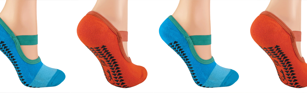 Close-up image of yoga socks with non-slip grip and traction dots on the soles, designed to provide stability and prevent slipping during yoga practice